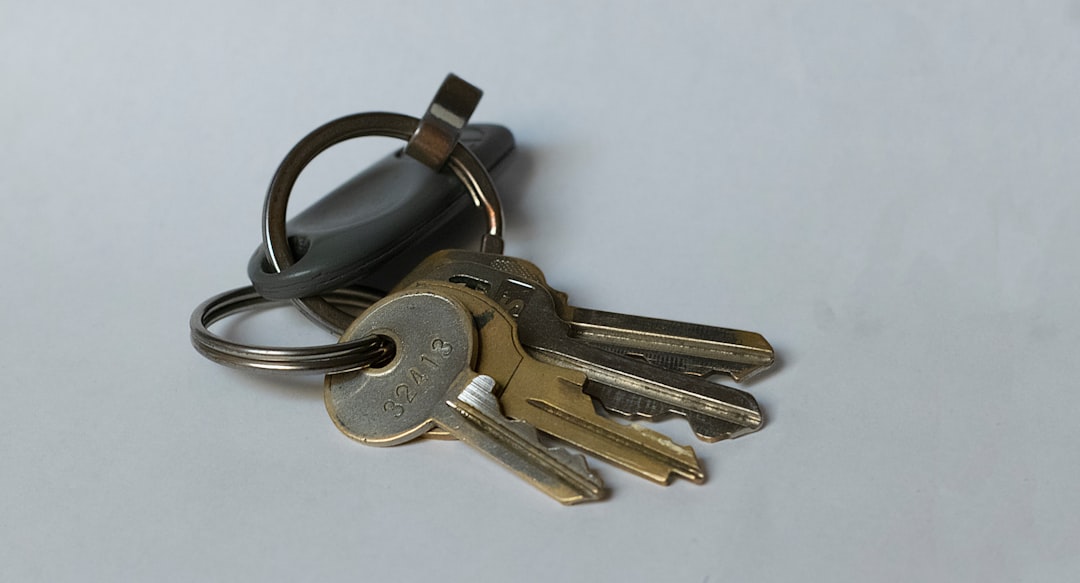 Car keys being handed over during a used vehicle purchase